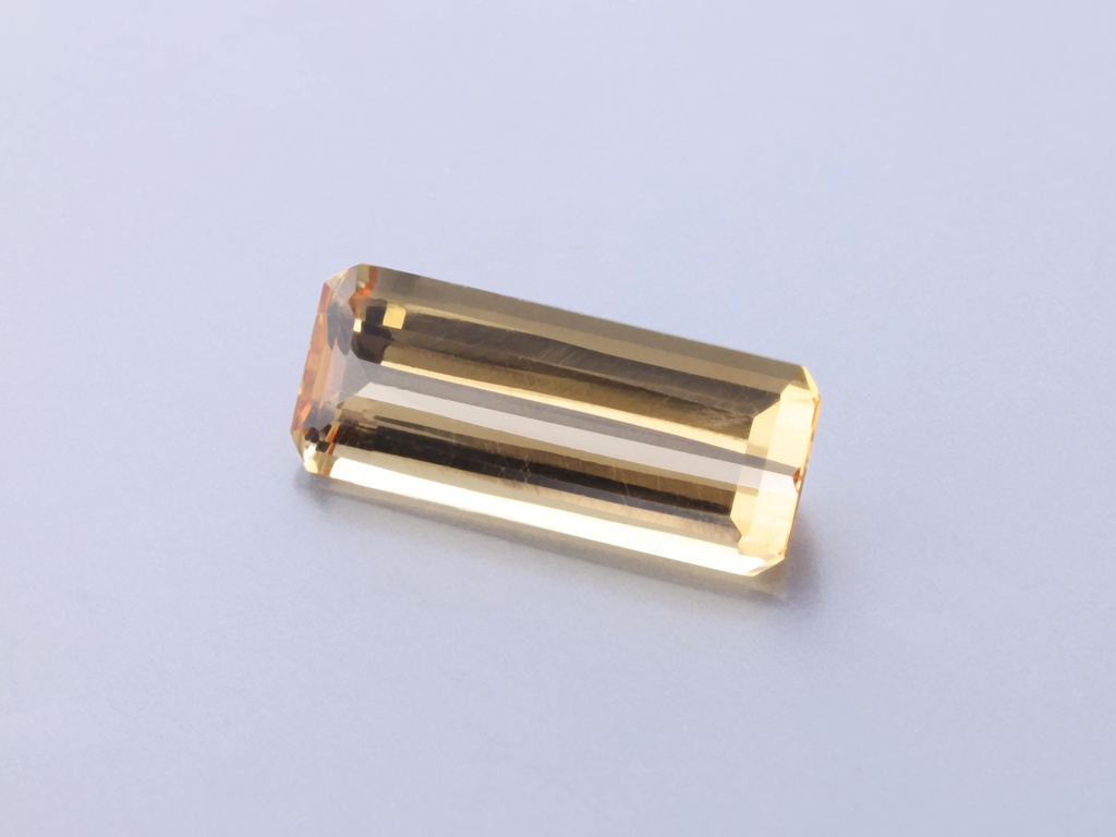 Imperial Topaz 11.7x4.8mm Emerald Cut