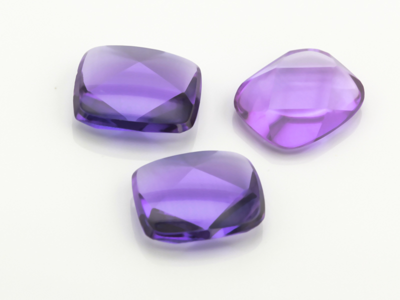 Synthetic/Lab Grown Sapphire 12x10mm Cushion Buff Top Faceted Back German Cut Purple