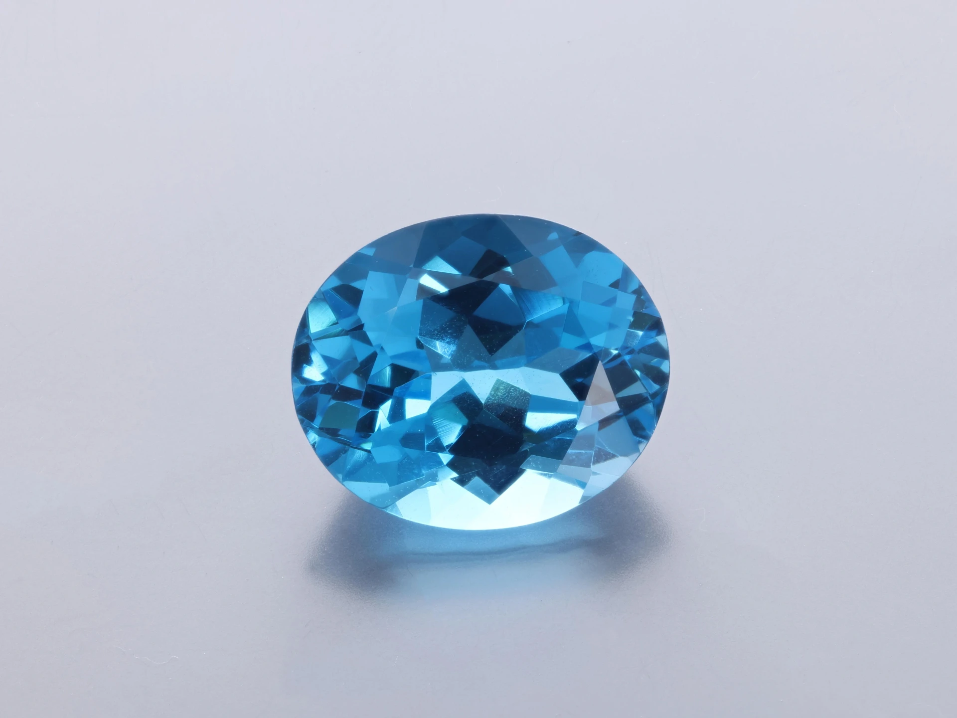 [TMVB1210] Topaz 12x10mm Oval Medium Blue