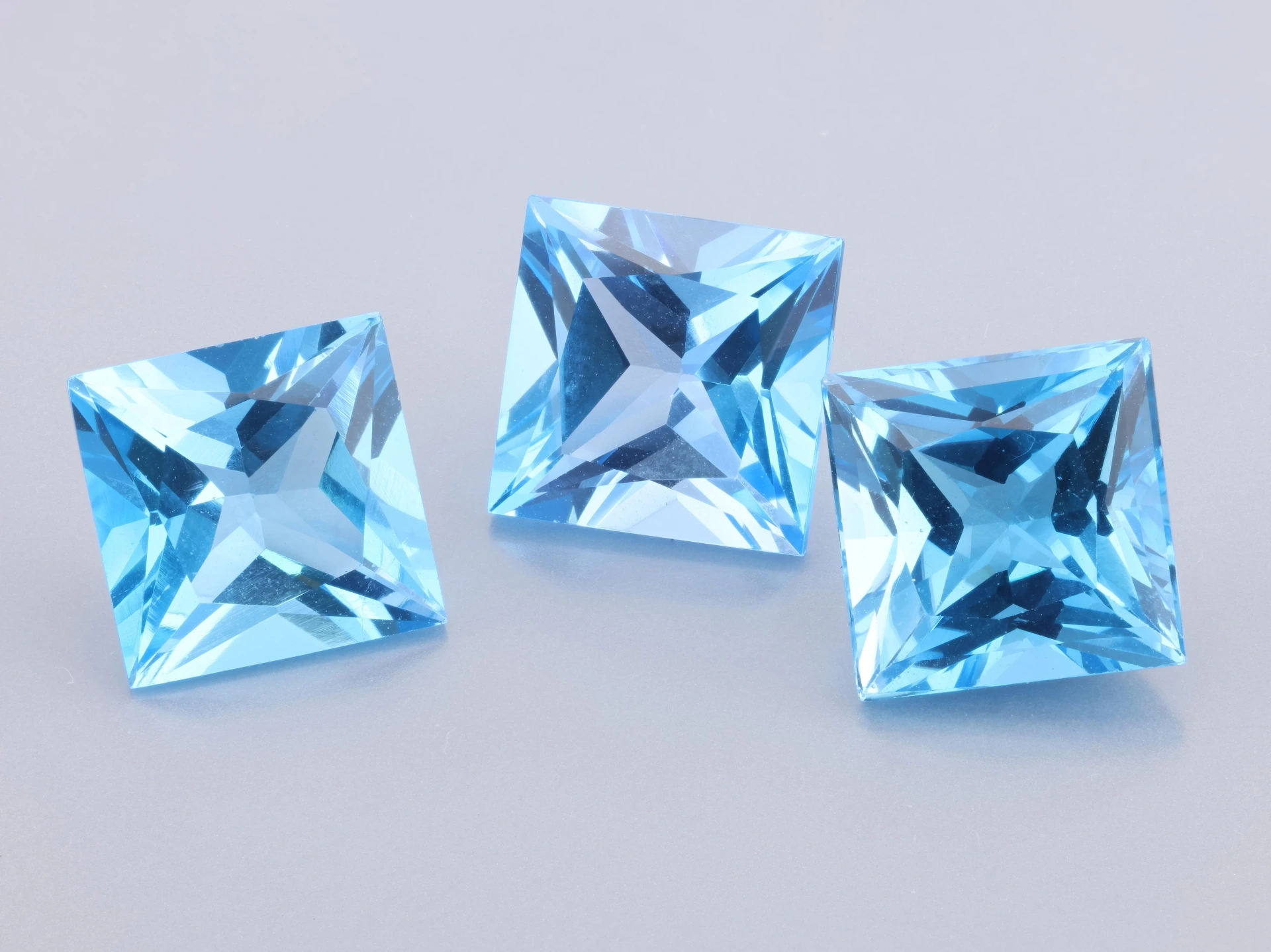[TMQP1000] Topaz 10mm Princess Cut Medium Blue