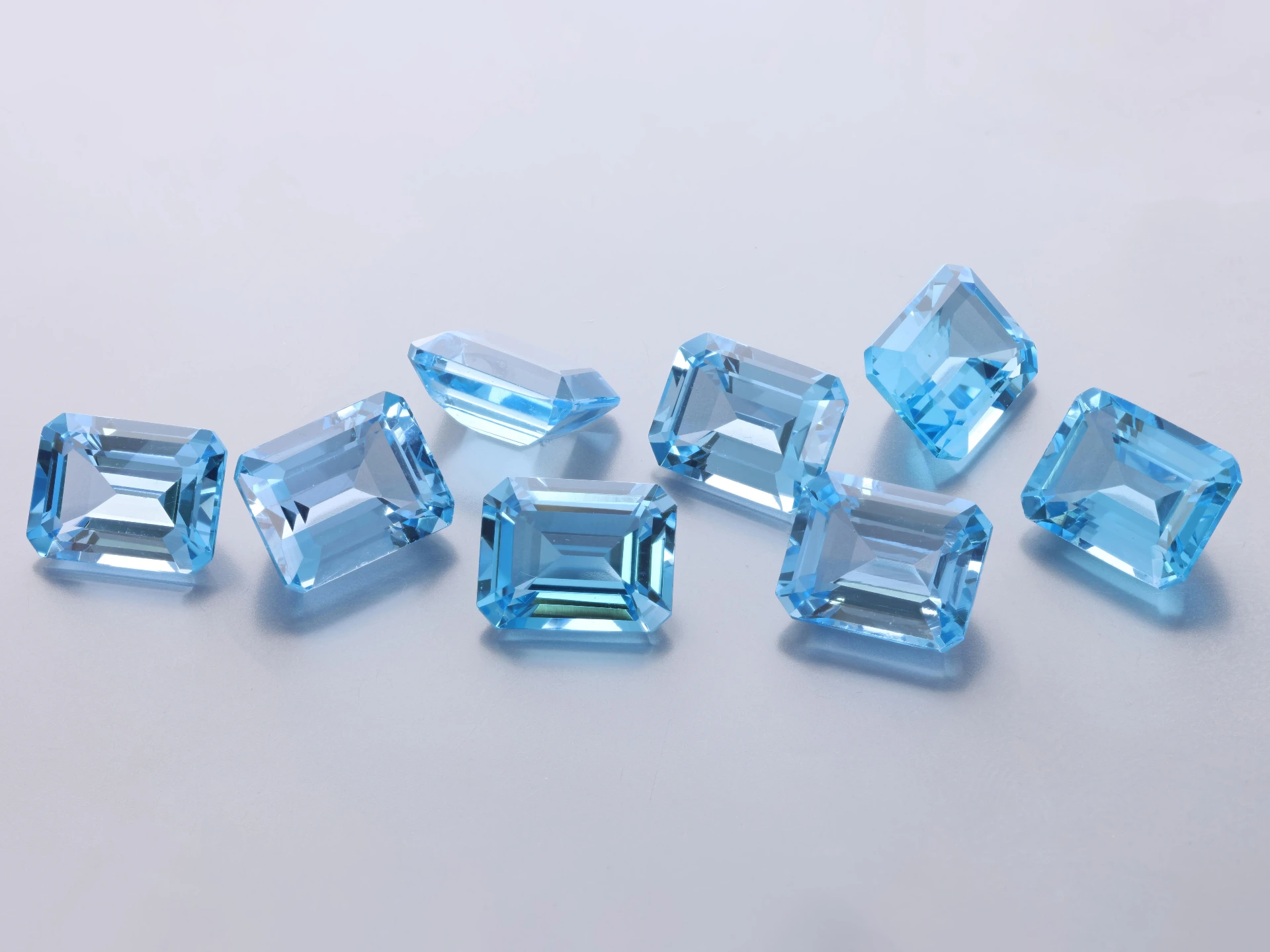 [TMOS0907] Topaz 9x7mm Emerald Cut Medium Blue