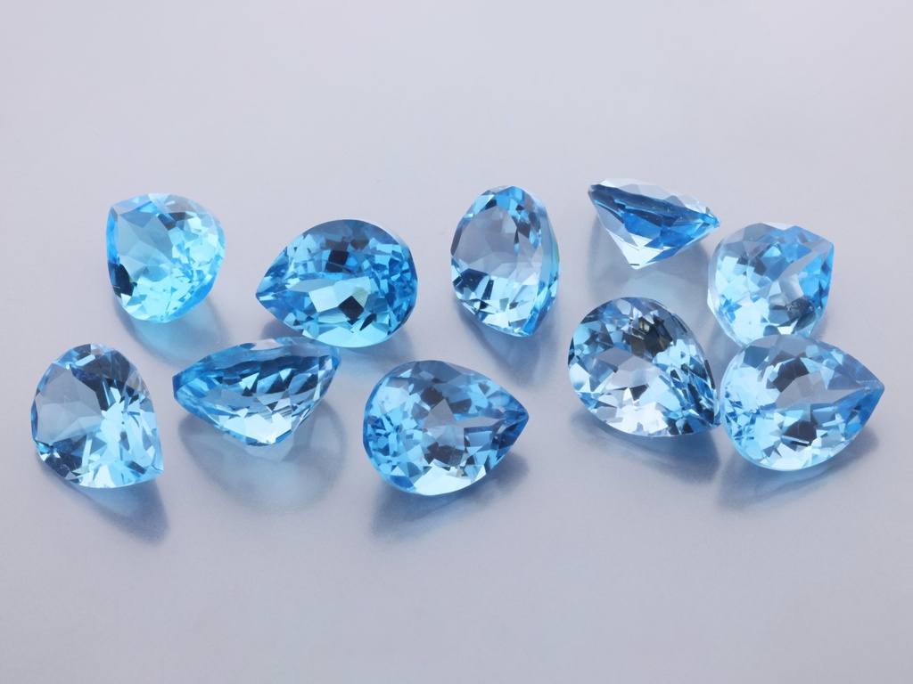[TMPB0907] Topaz 9x7mm Pear Shape Medium Blue 