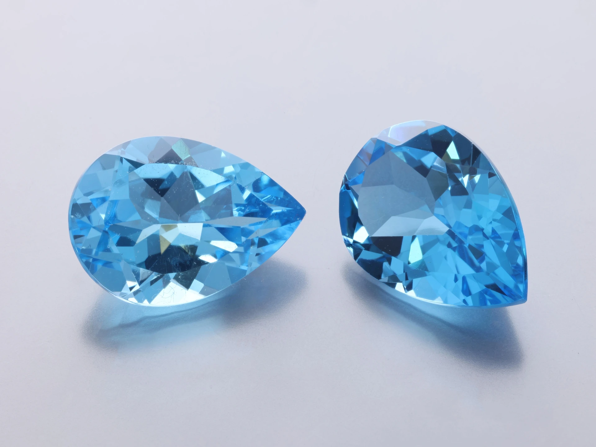 [TMPB1410] Topaz 14x10mm Pear Shape Medium Blue 