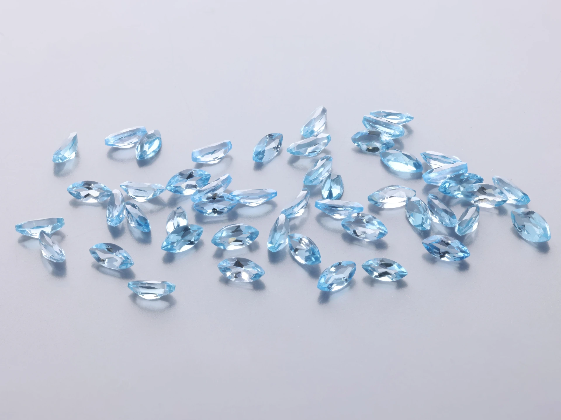 [TMMB0402] Topaz 4x2mm Marquise Medium Blue 