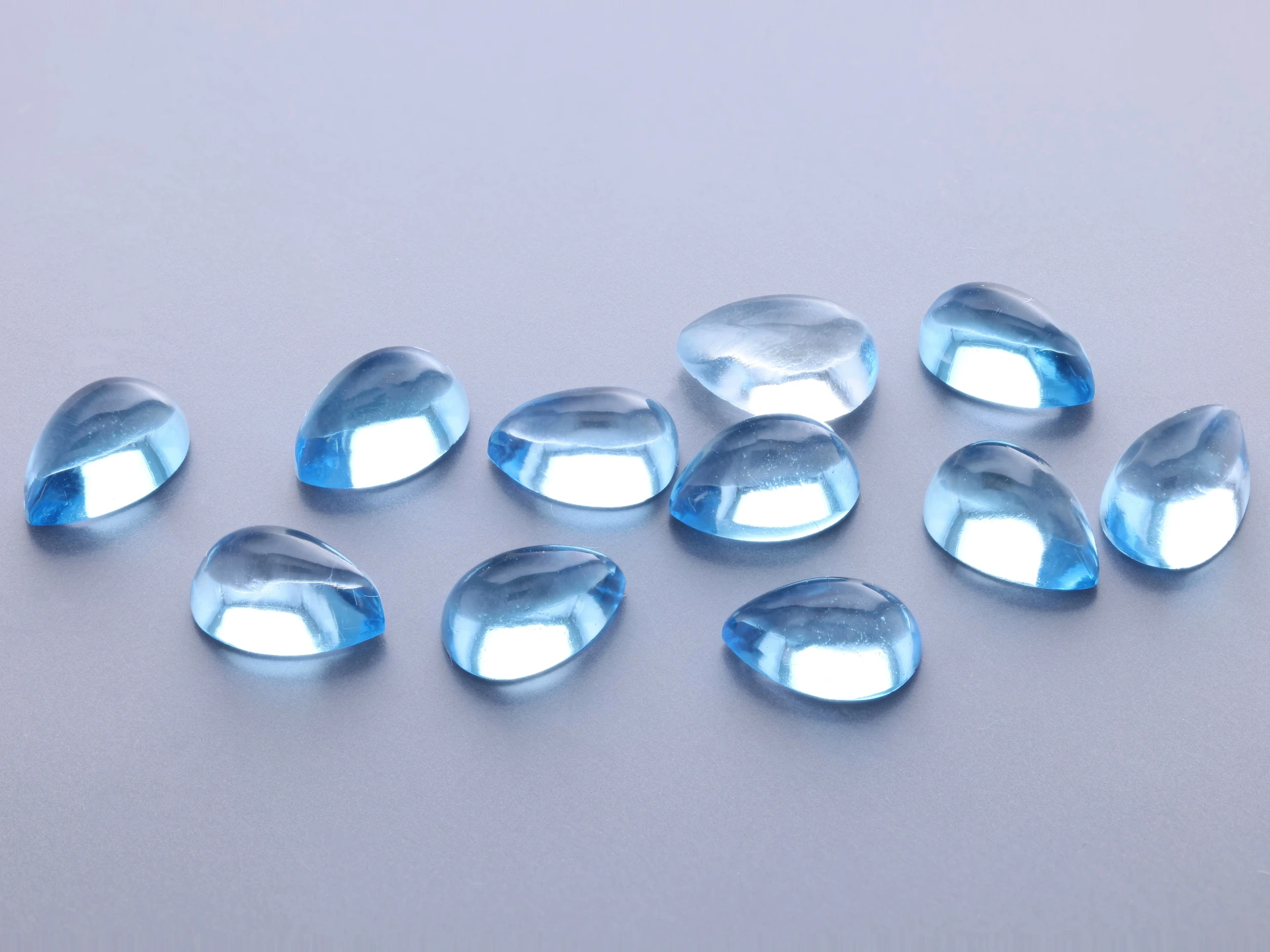 [TMPC0604] Topaz 6x4mm Pear Shape Cabochon Medium Blue