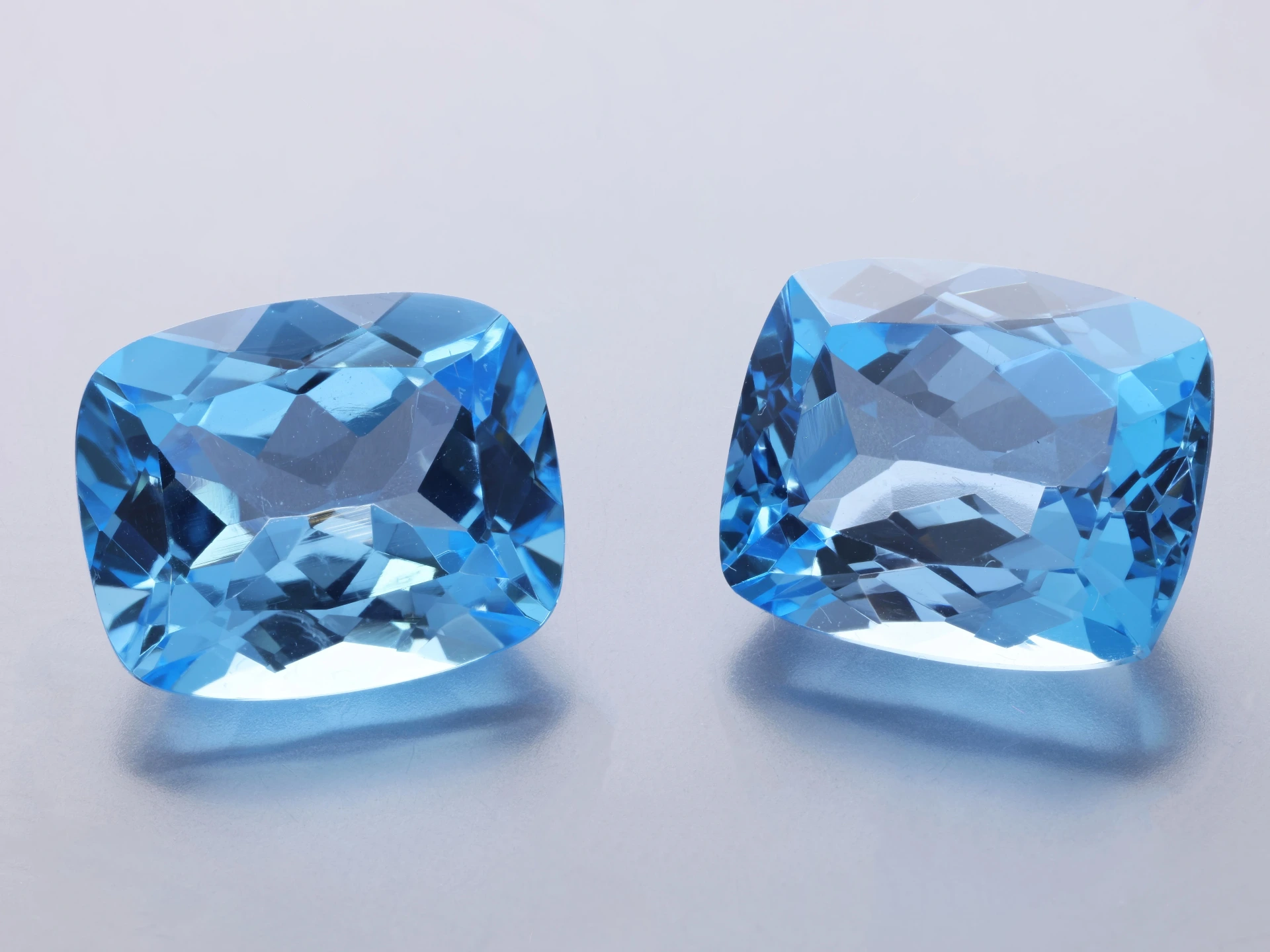 [TMAB1210] Topaz 12x10mm Cushion Medium Blue