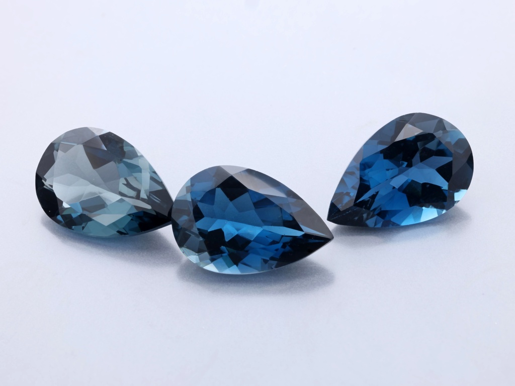 [TLPB1208] Topaz London Blue 12x8mm Pear Shape 