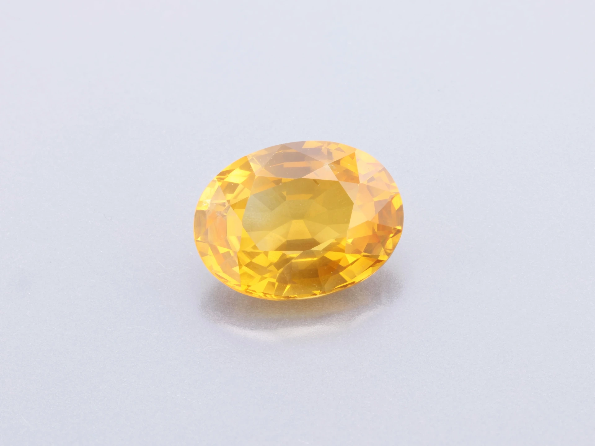 [SYVB0806X4] Montana Sapphire 8.19 x 6.16 x 3.84mm Oval Orange