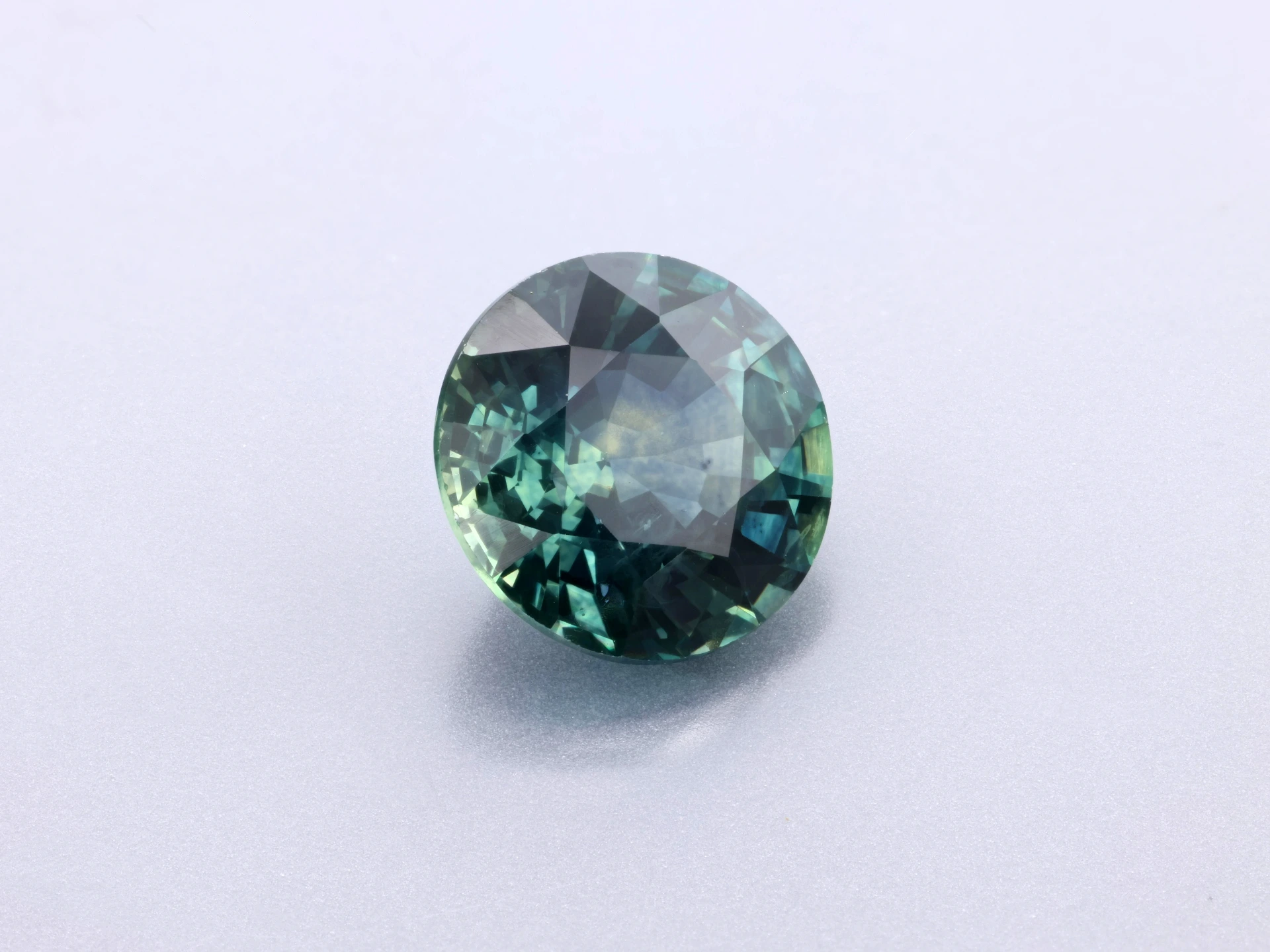 [SMRB0675X2] Montana Sapphire 6.77 x 6.65 x 4.15mm Round Teal